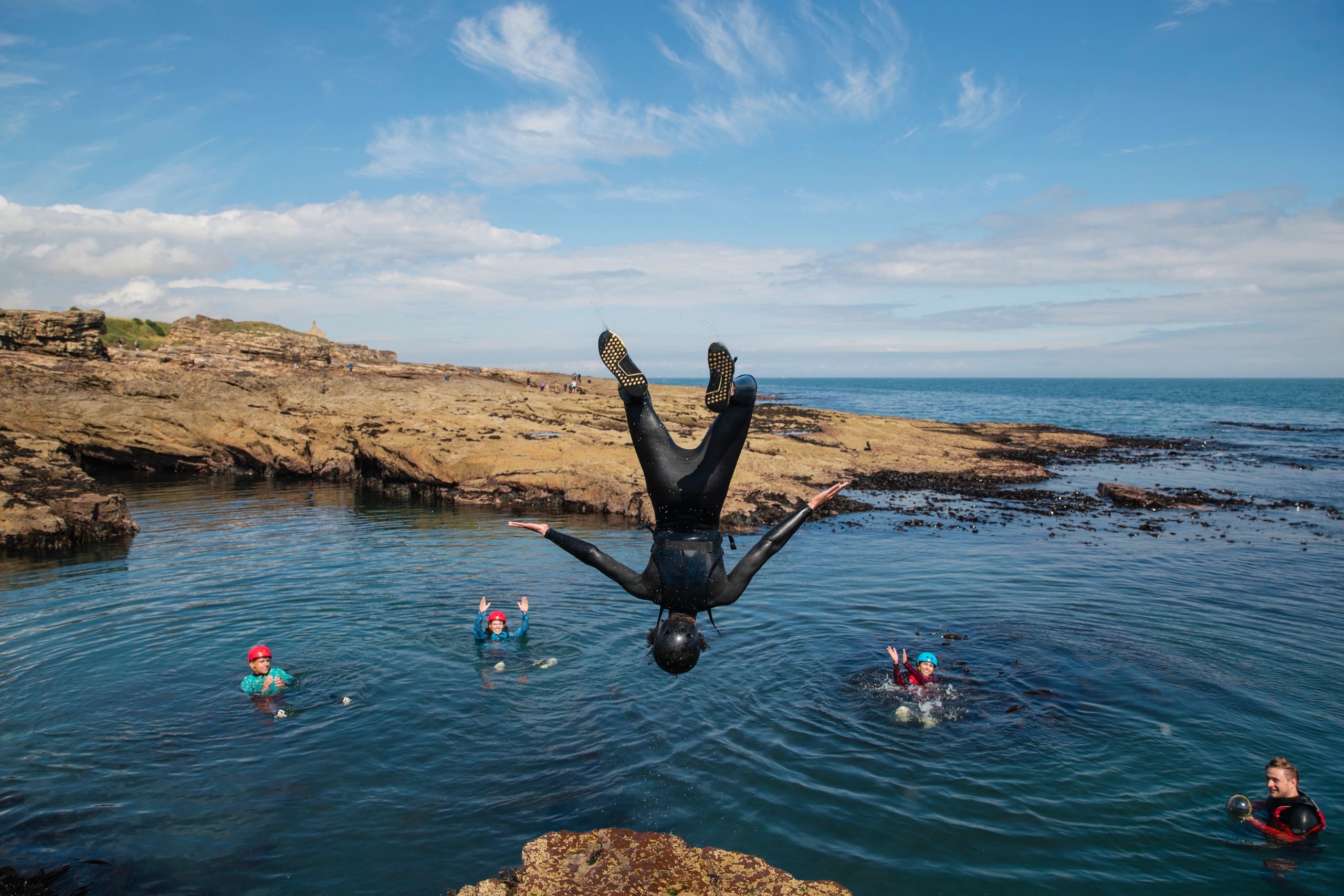 Adventure travelers by the sea