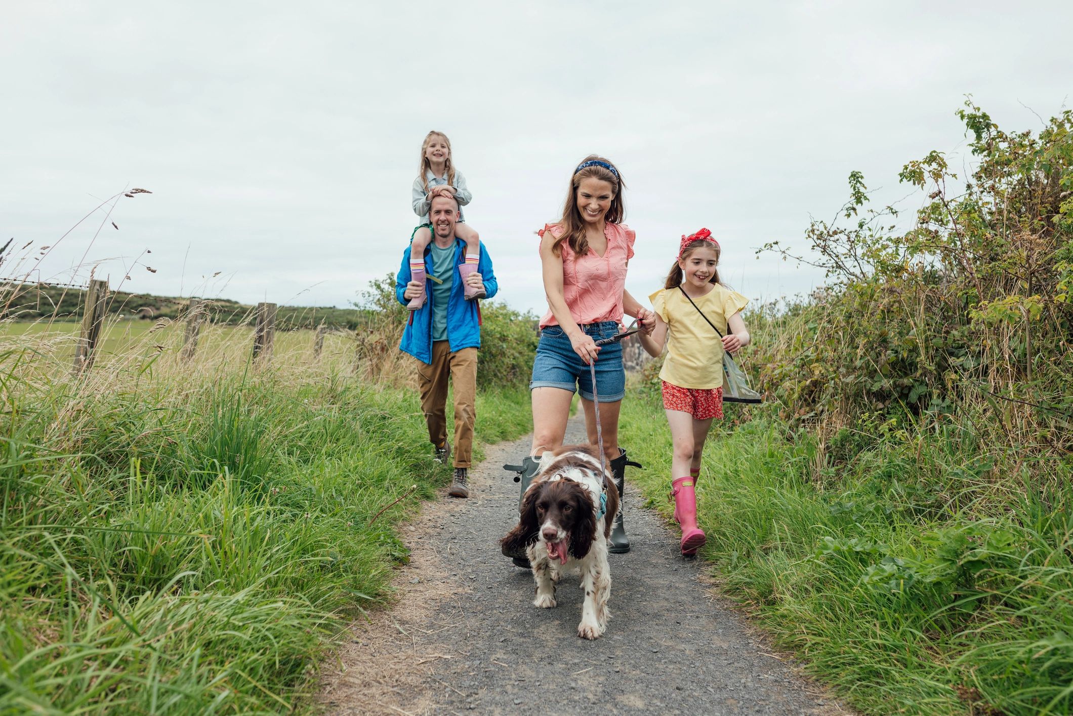 Travelers enjoying a scenic coastal walking route